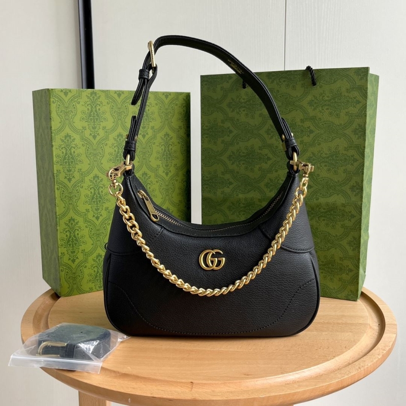 G*u*i top handle bags